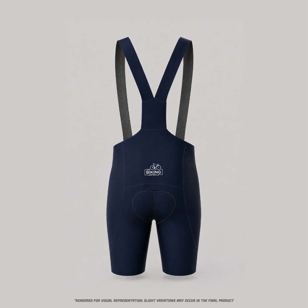 Navy blue cycling bib shorts with a logo on a light gray background